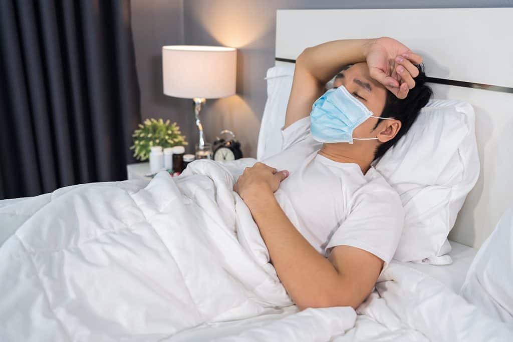 Man Sleeping with Face Mask