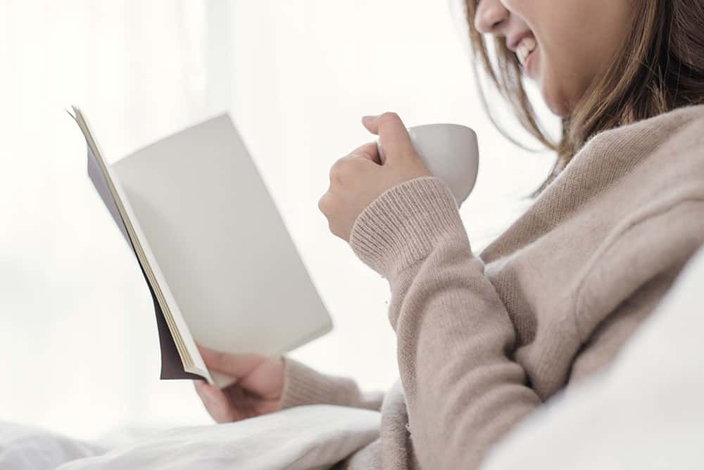 reading sitting upright in bed