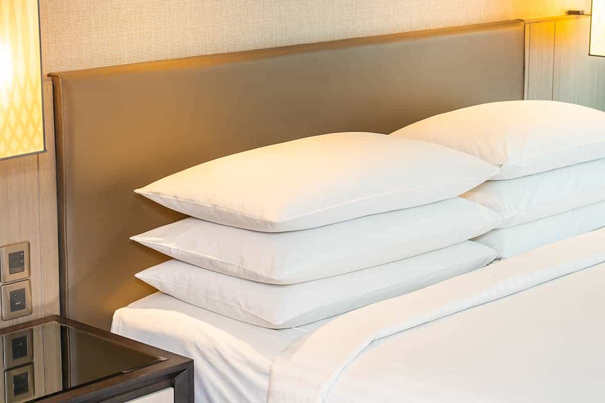 pillows stacked on bed