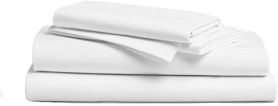 A stack of while bed sheets