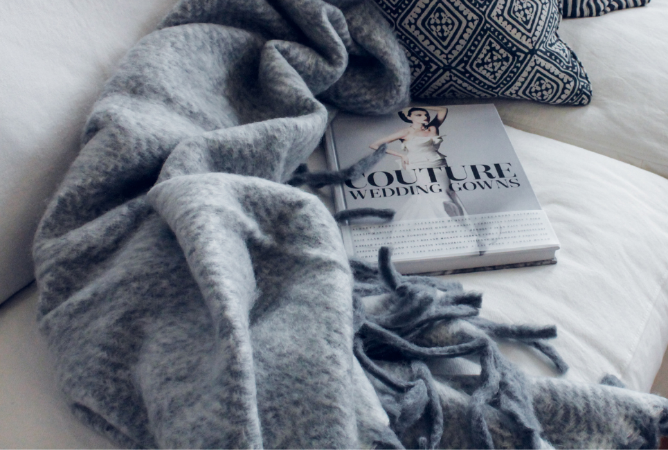 cozy soft blanket and book about fashion