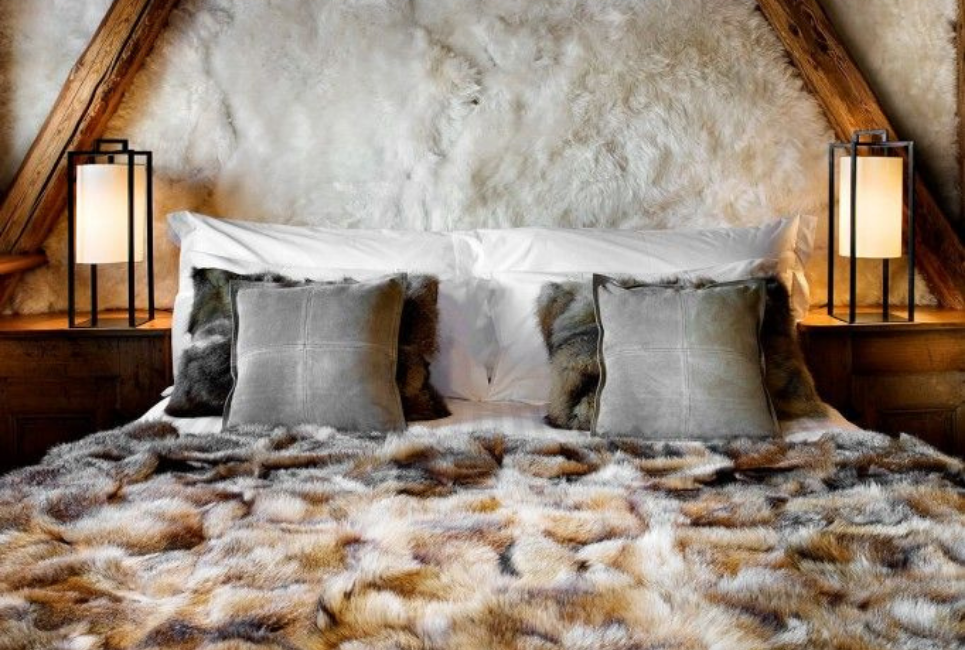 faux fur comforter on bed with faux fur walls