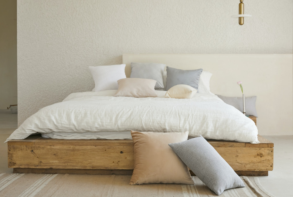 Trendy Neutral bedding on modern bed
