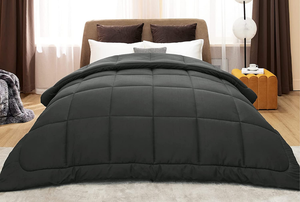 black comforter in neutral room