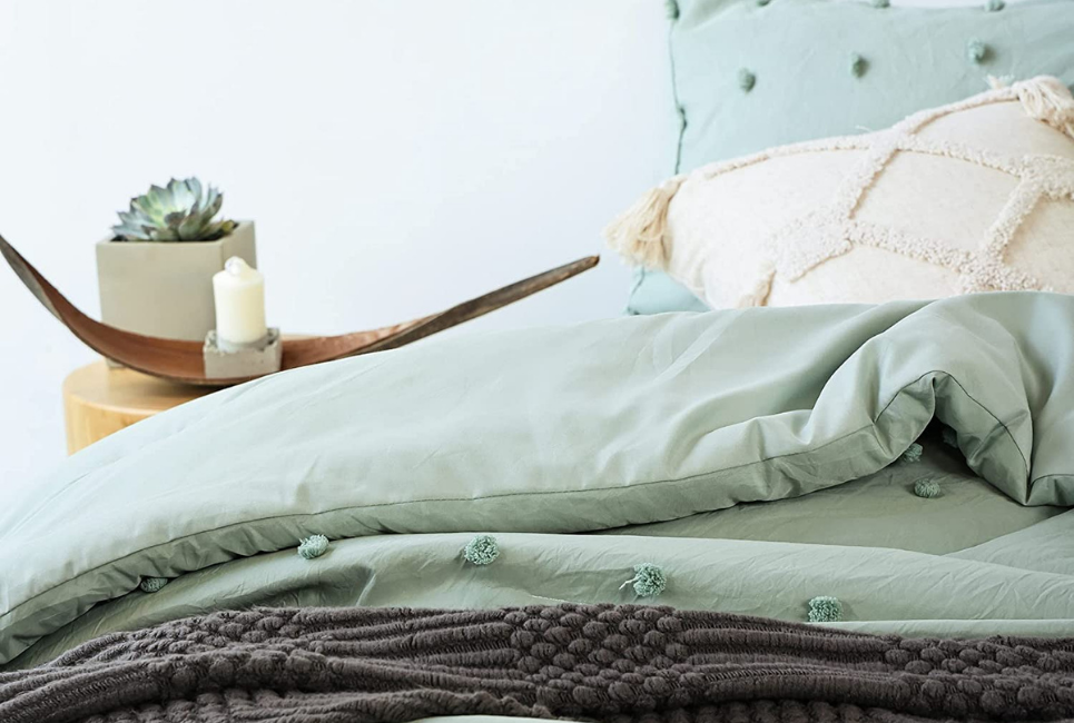 Sage Green Comforter Close up in Trendy Room