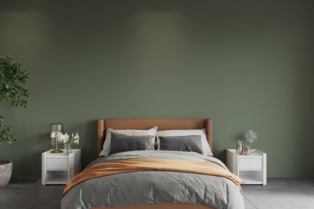 Bed with Green Wall at Back