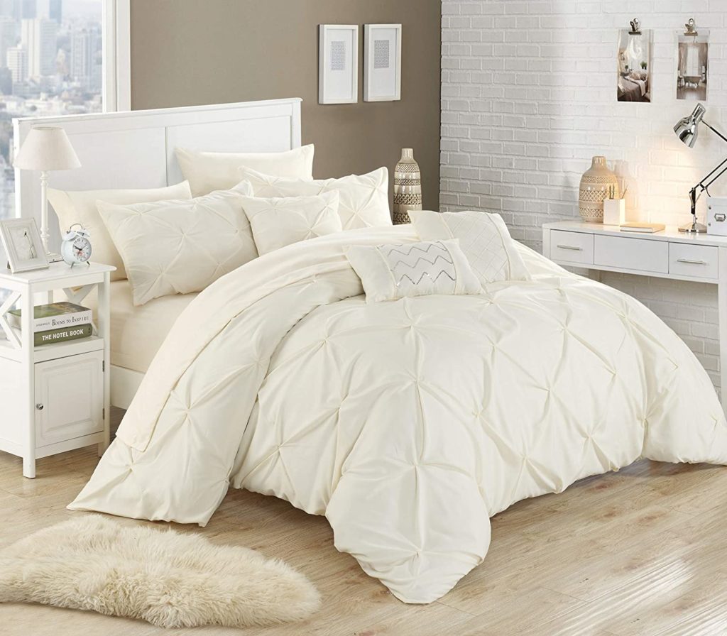 cream luxurious bedding set in chic white room