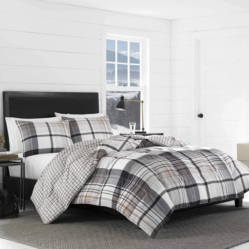black and beige plaid bedding set styled in farmhouse style room