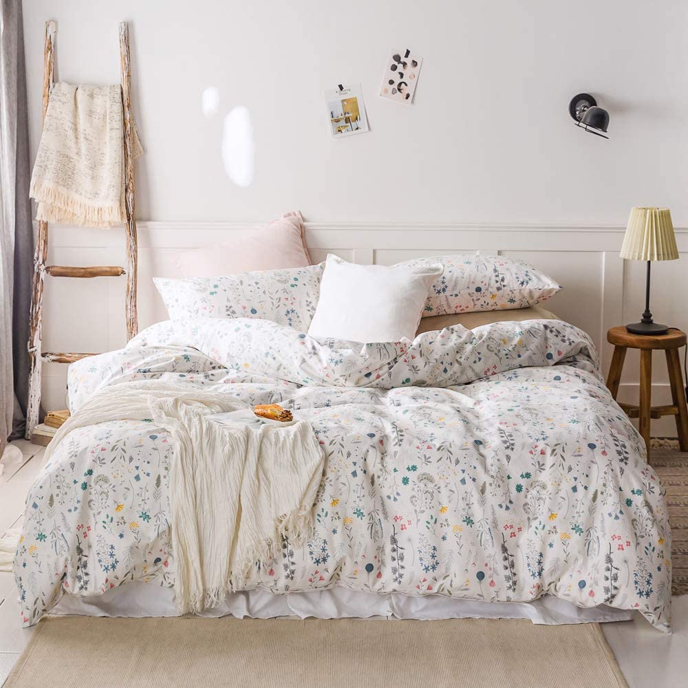 Dainty Botanical Floral Comforter on unmade bed