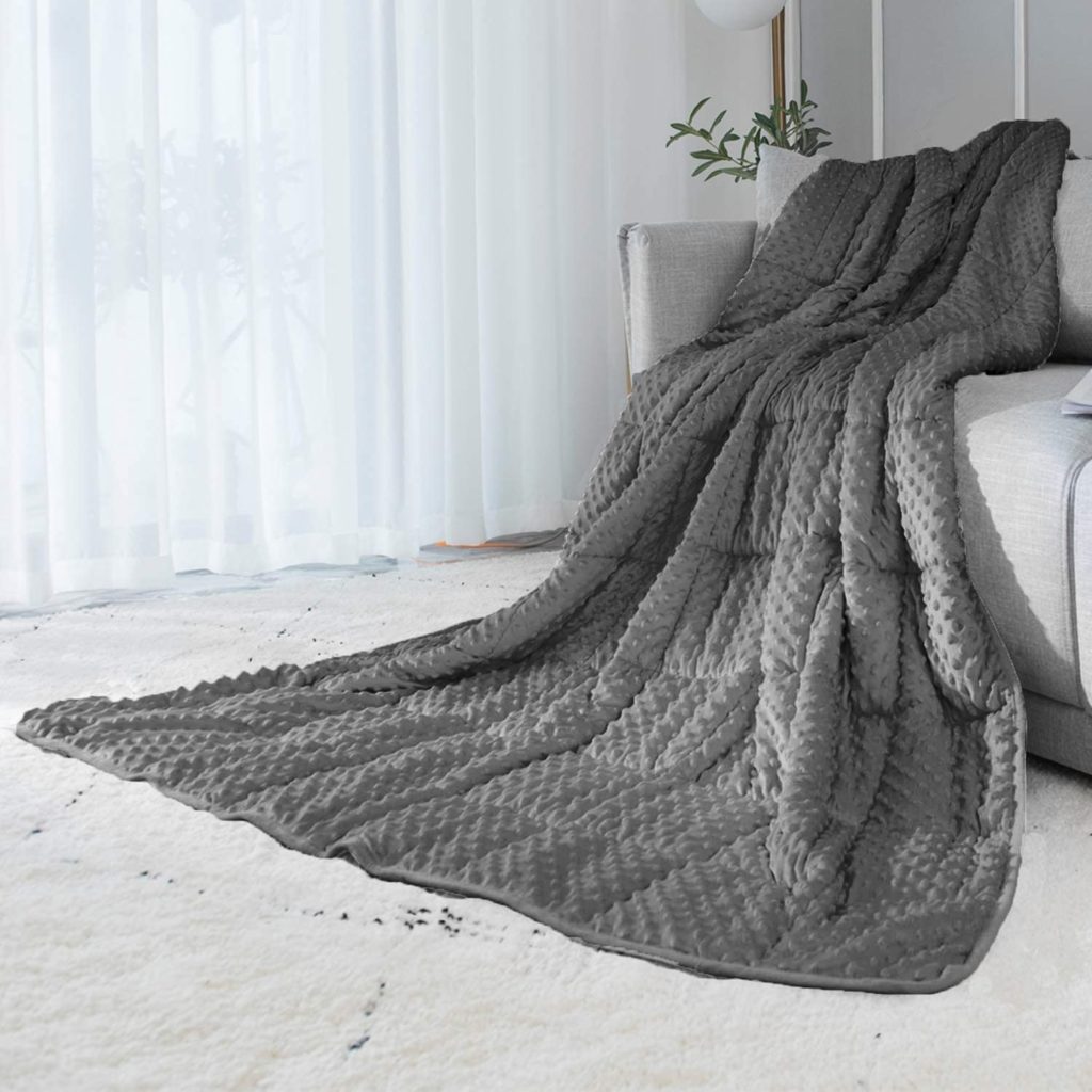 Grey Weighted Blanket with Texture draped over couch