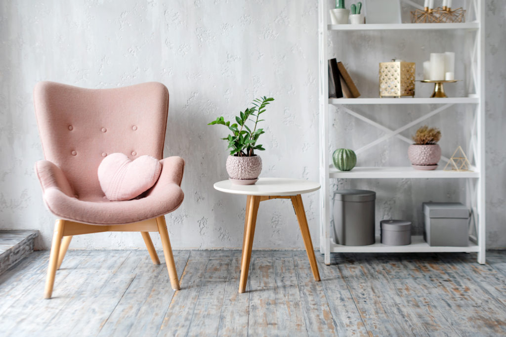 pink accent chair in trendy room