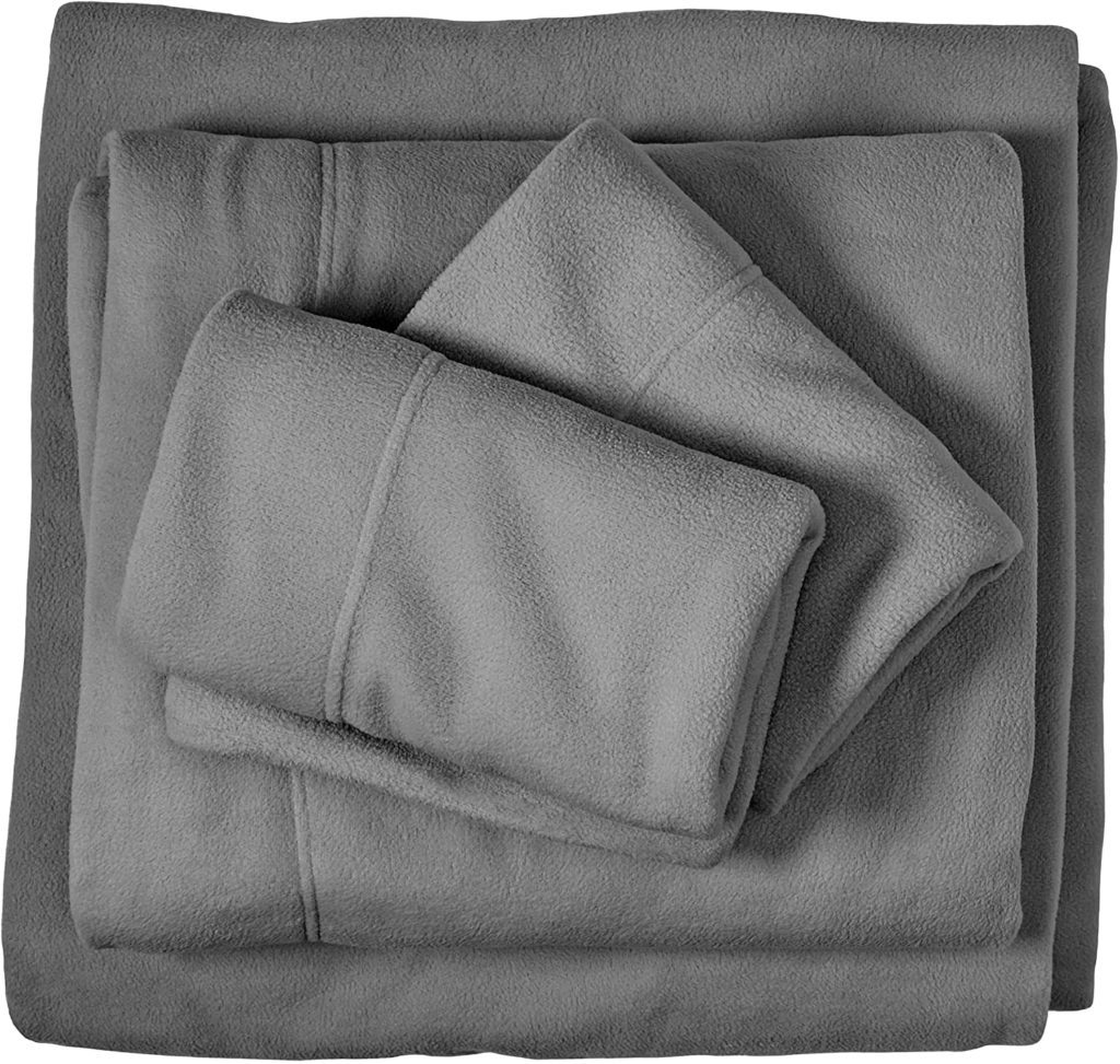 neatly folded grey fleece sheets