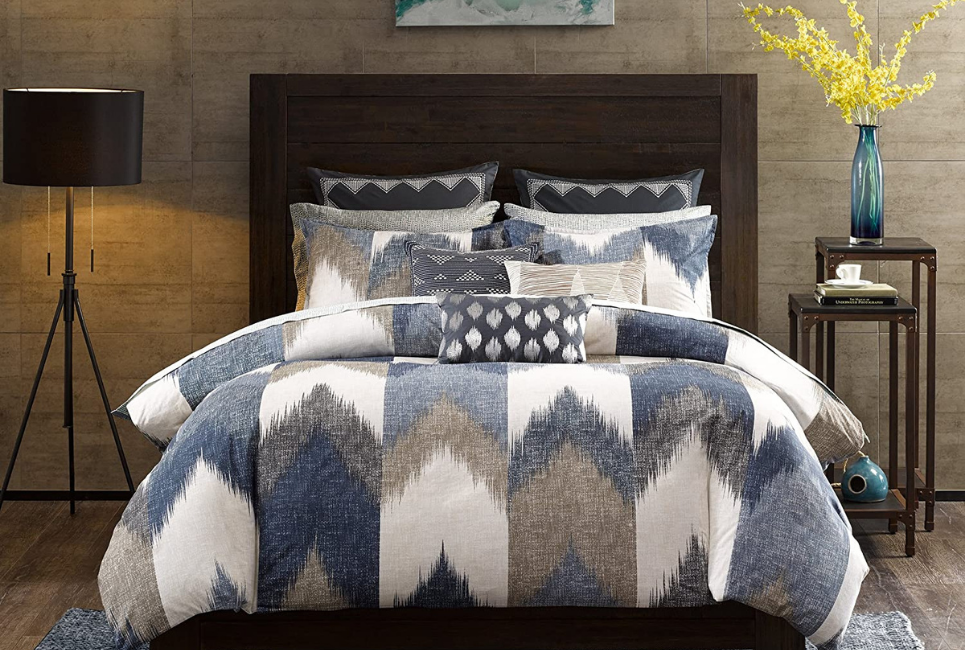 Blue, White and Grey Chevron Bedding on bed