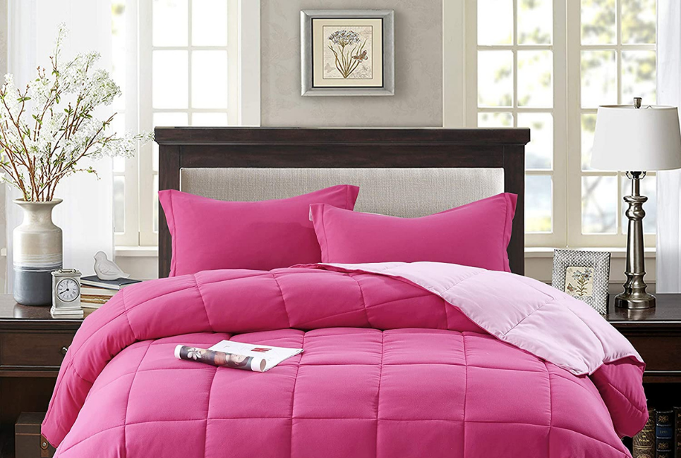 Dark Pink and Light Pink Reversible Comforter on bed