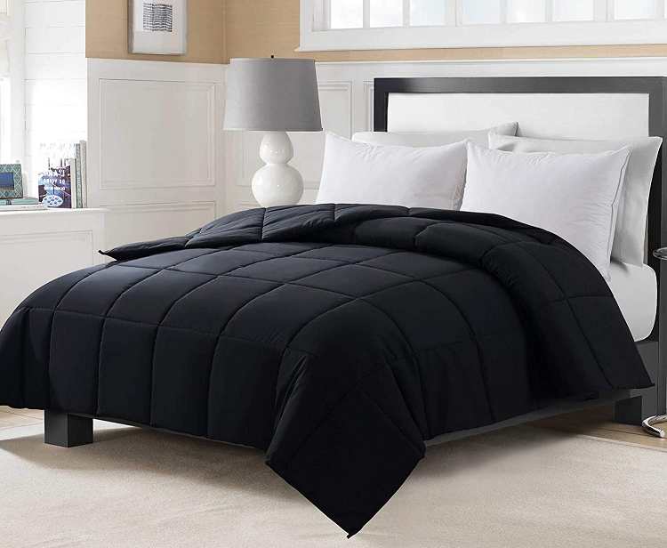 Black Comforter in simple, clean room
