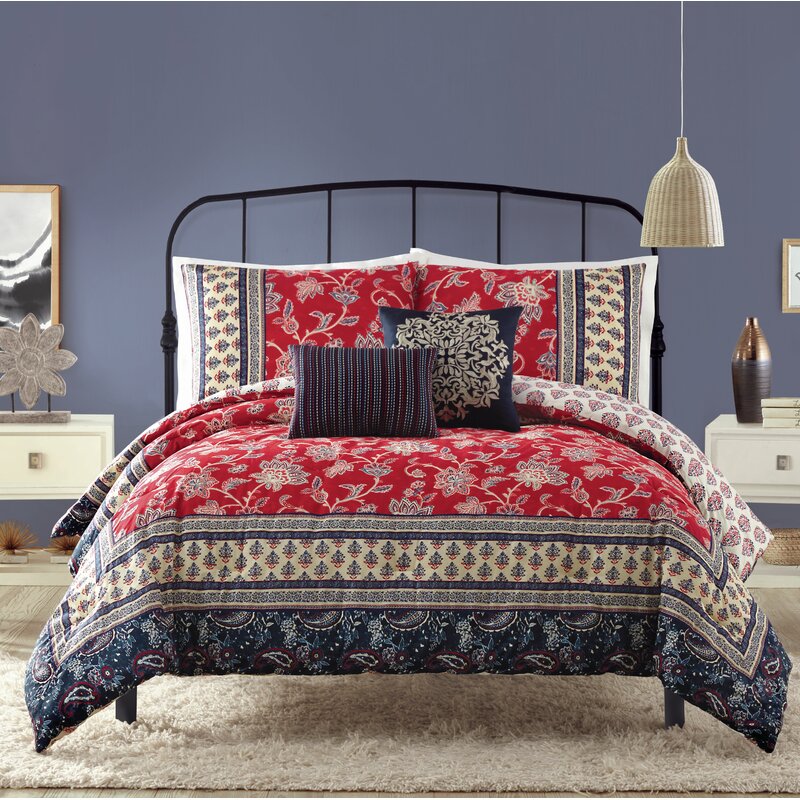 Boho Pattern Red and Blue Reversible Comforter on bed