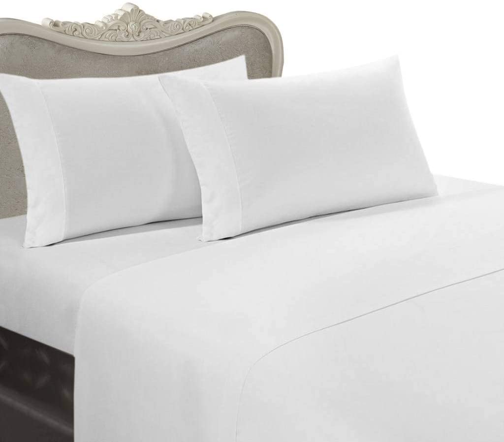 cream sheets on elegant bed