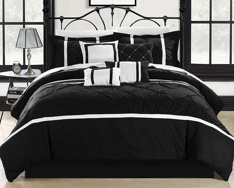 Black and White neatly made bed