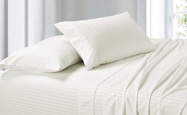 Royal Tradition Stripe Waterbed Sheet Set in White on Bed