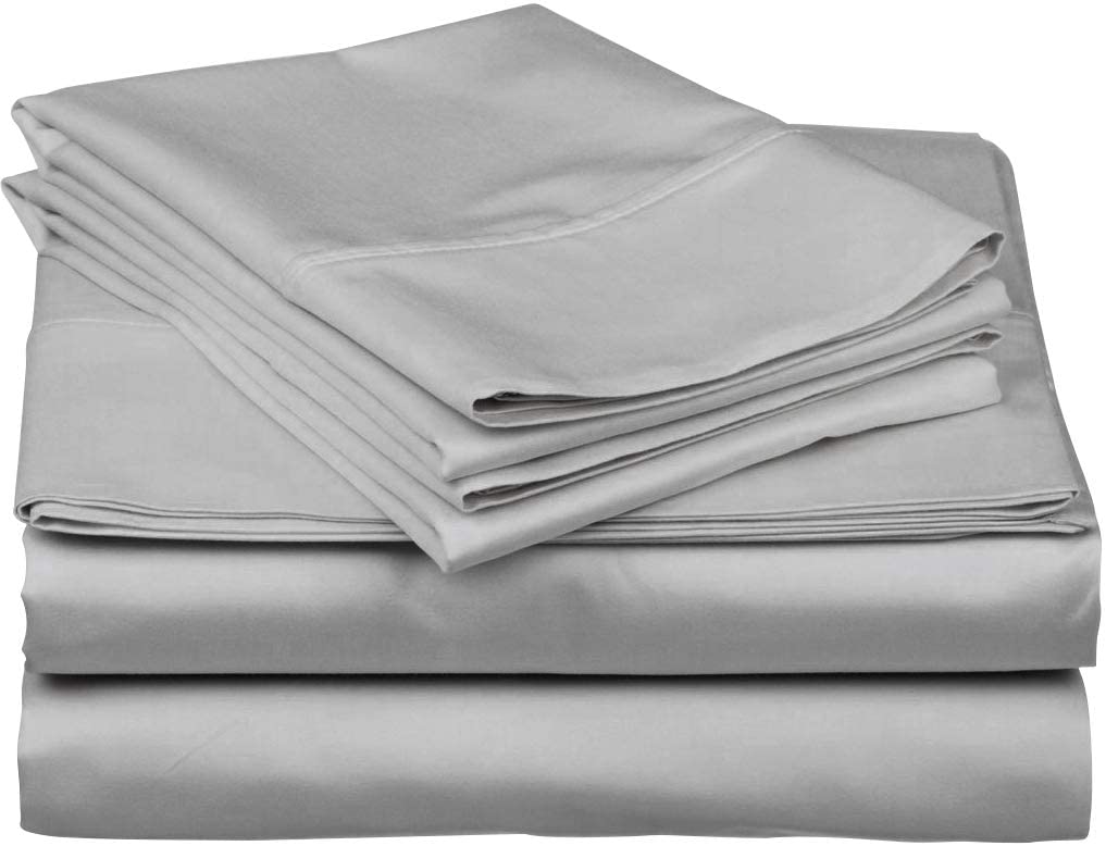 neatly folded light gray sheets