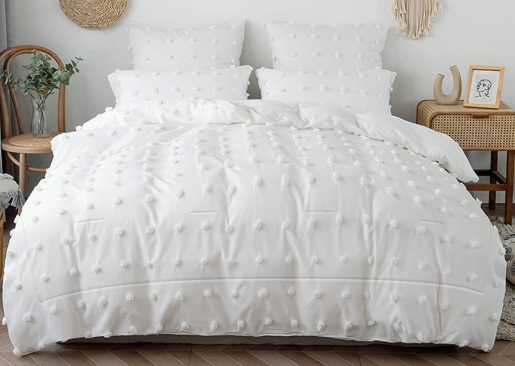 Tufted Chenille White Comforter in cozy room