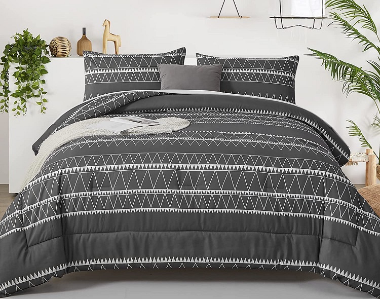 Wongs Bedding Grey and White Geometric Comforter on neatly made bed