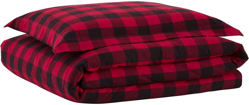 black and red buffalo check comforter and pillow set neatly folded