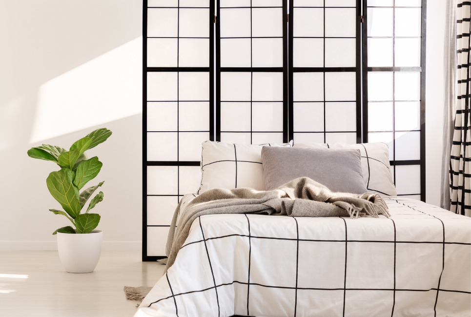 black and white geometric comforter in trendy room