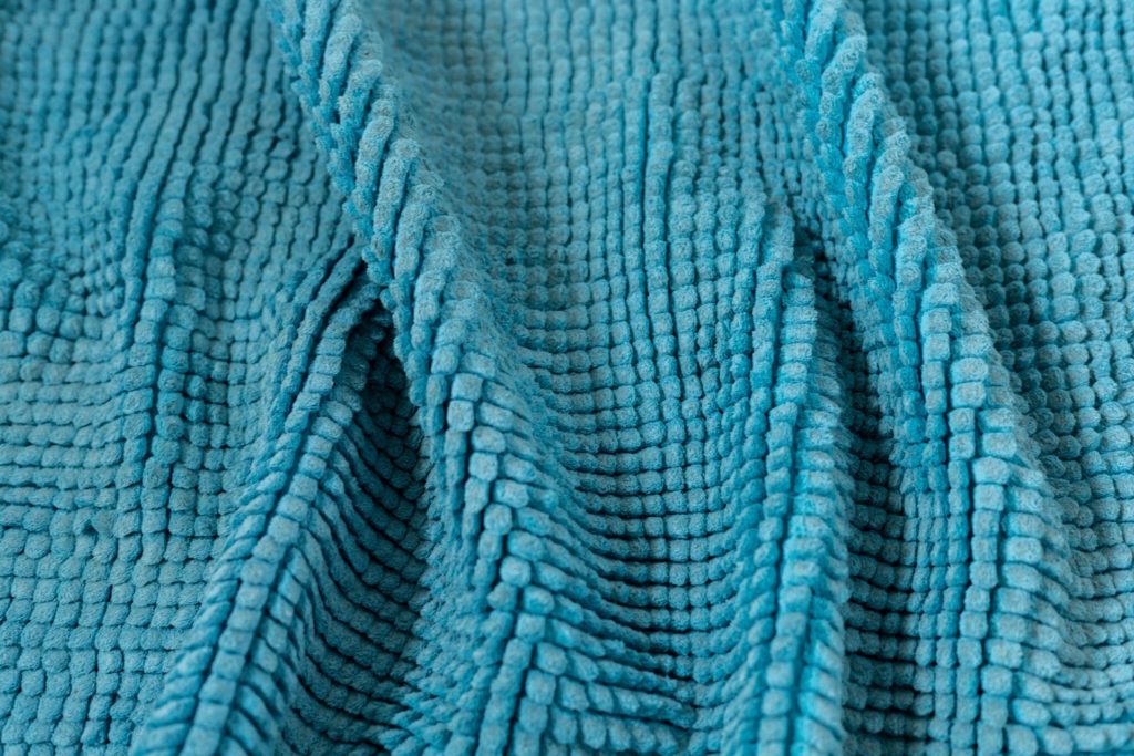 teal textured soft blanket material
