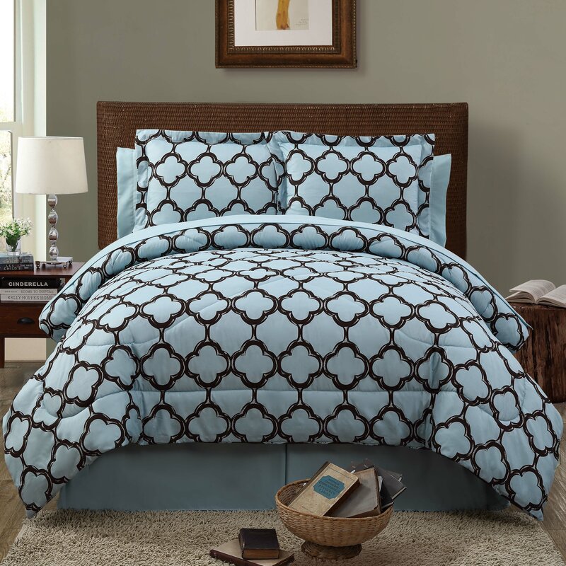 blue and black patterned boho comforter
