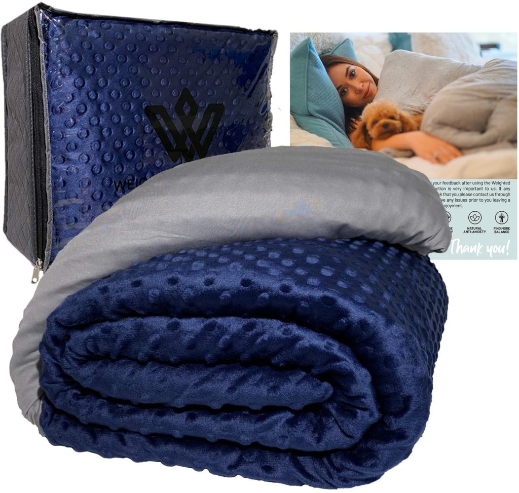 blue and grey velvet weighted blanket folded and with packaging