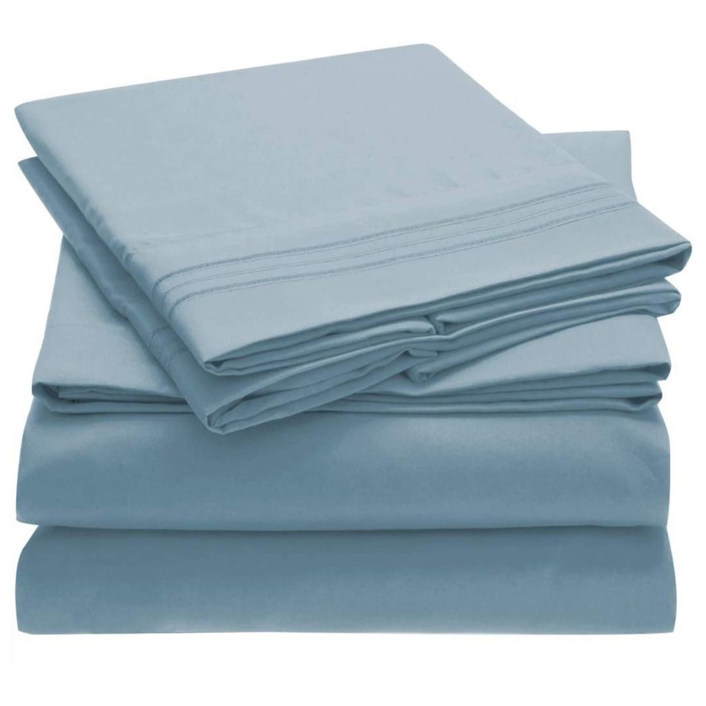 blue sheet set stacked neatly
