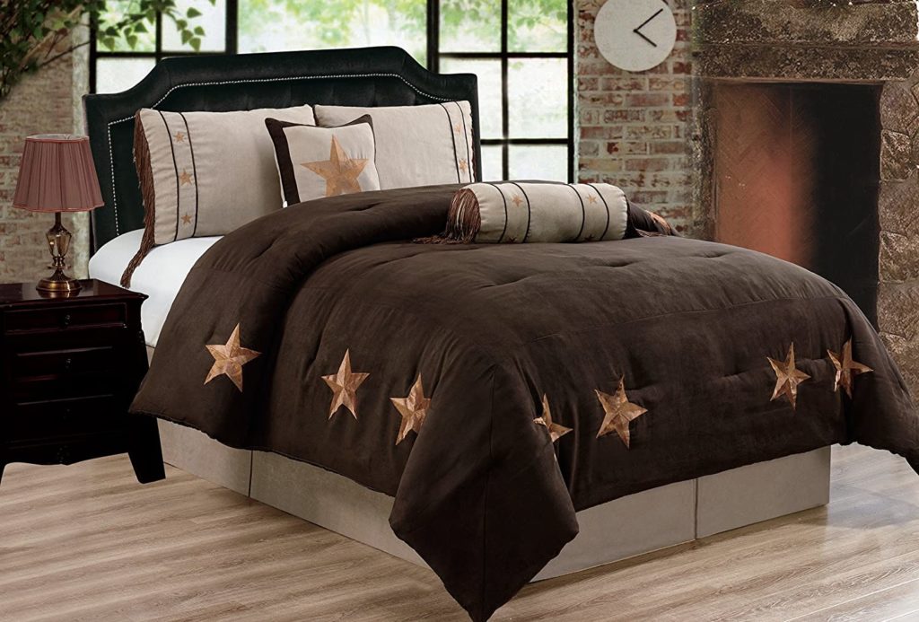 brown comforter and bedding with star pattern on it