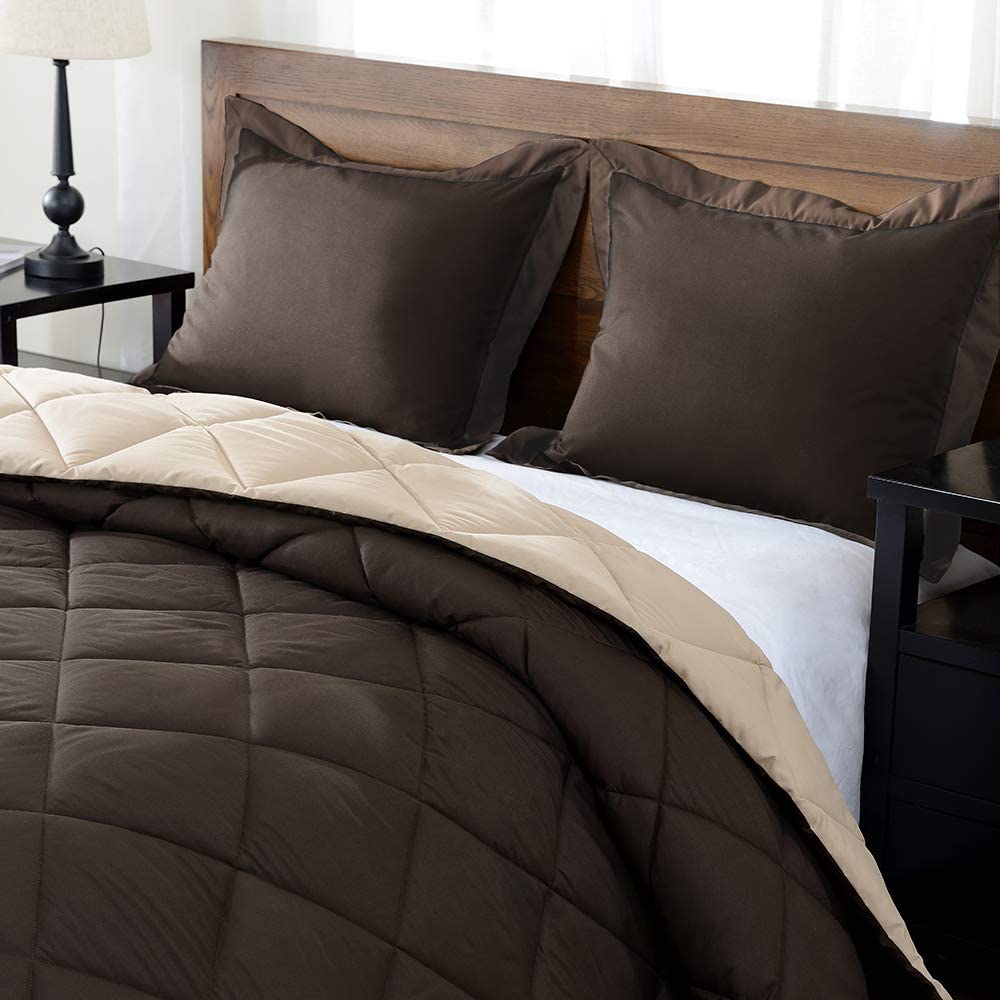 brown comforter and pillows on bed