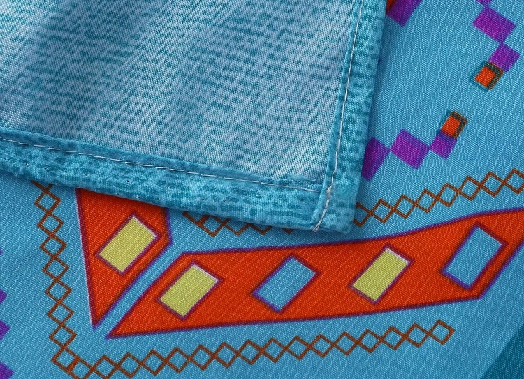 close up of patterned bold colored sheet corner