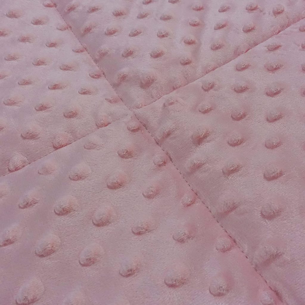 close up of pink velet blanket texture