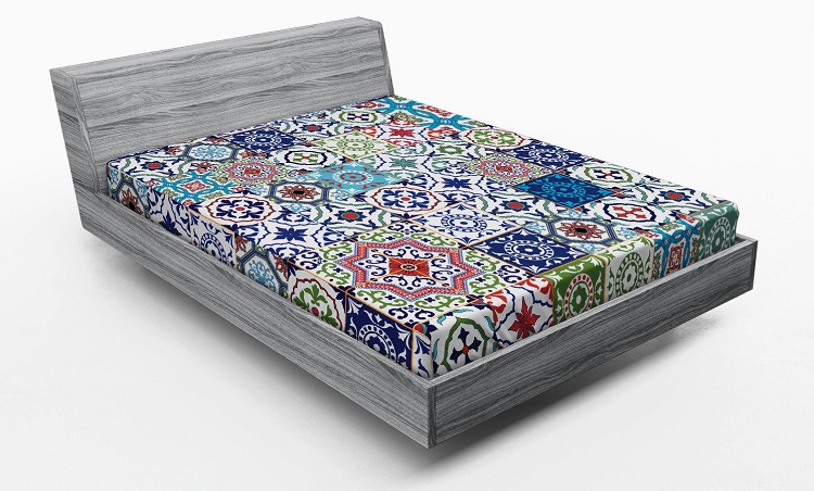 colorful patchwork patterned boho fitted sheet on mattress