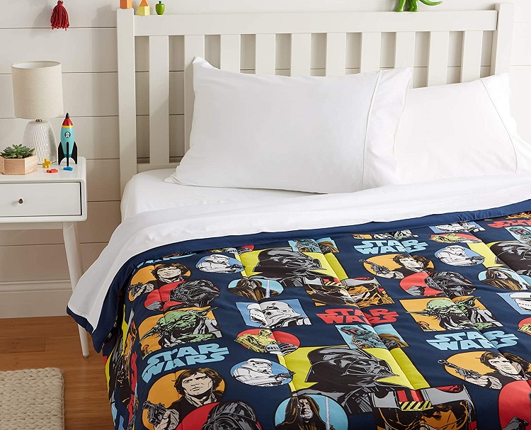 colorful star wars pop art comforter on bed
