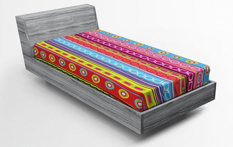colorful stripe patterned boho fitted sheet on mattress