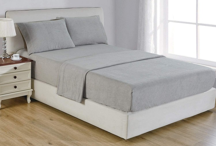 grey fleece sheets on bed