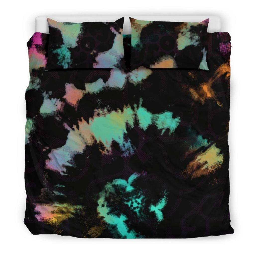 black and neon tie dyed duvet set on bed