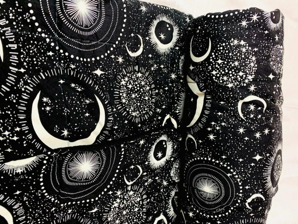 black bedding with white night sky print 
