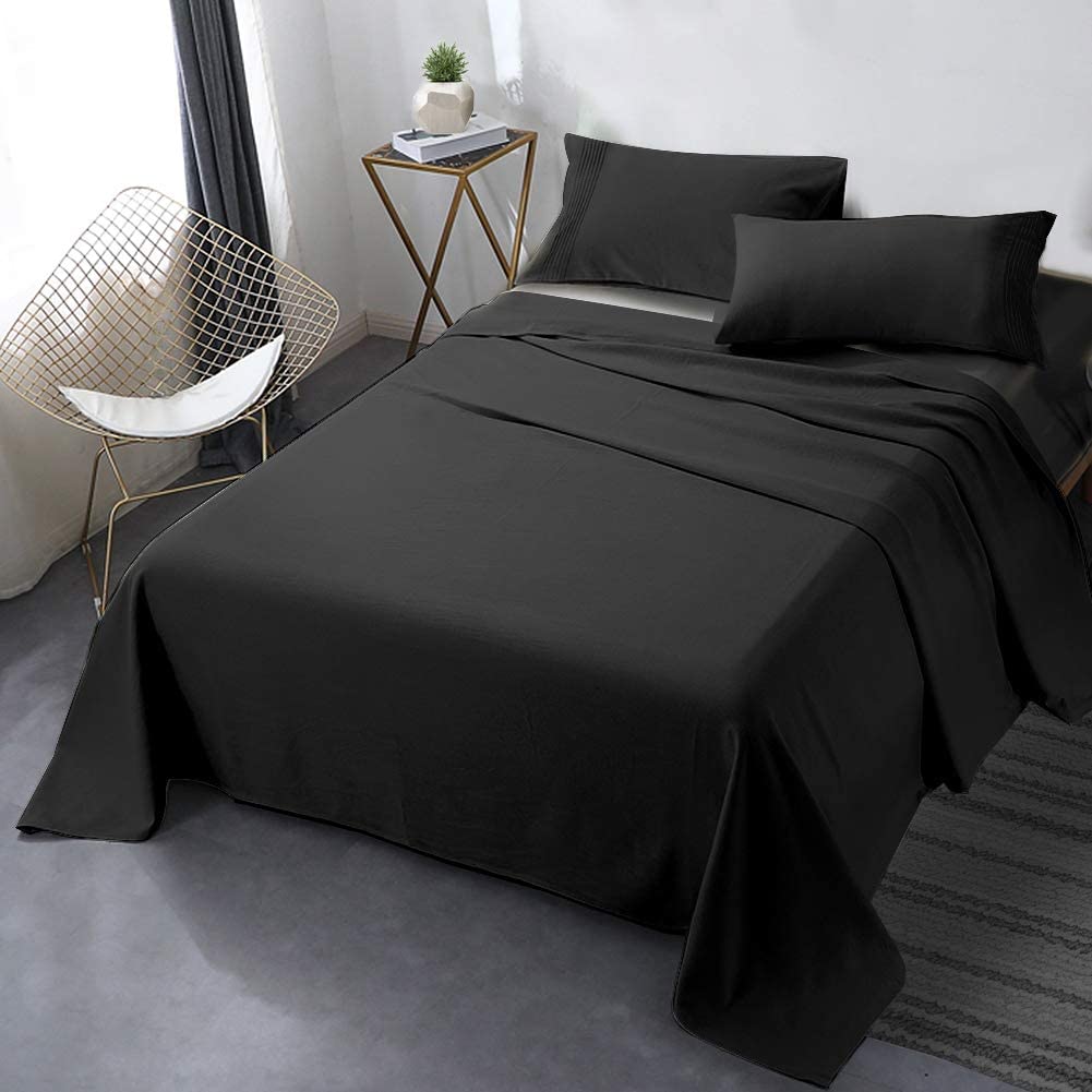 modern bedroom with black sheets