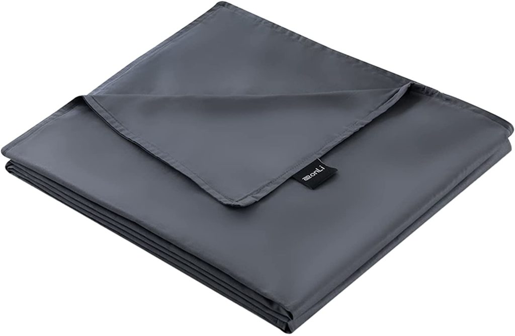 neatly folded dark grey blanket cover