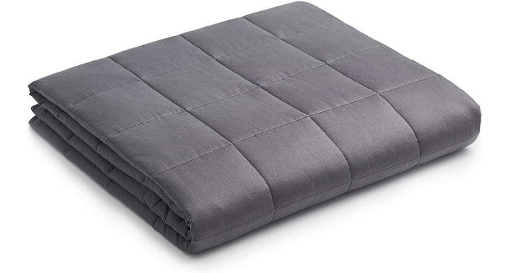neatly folded grey blanket 1