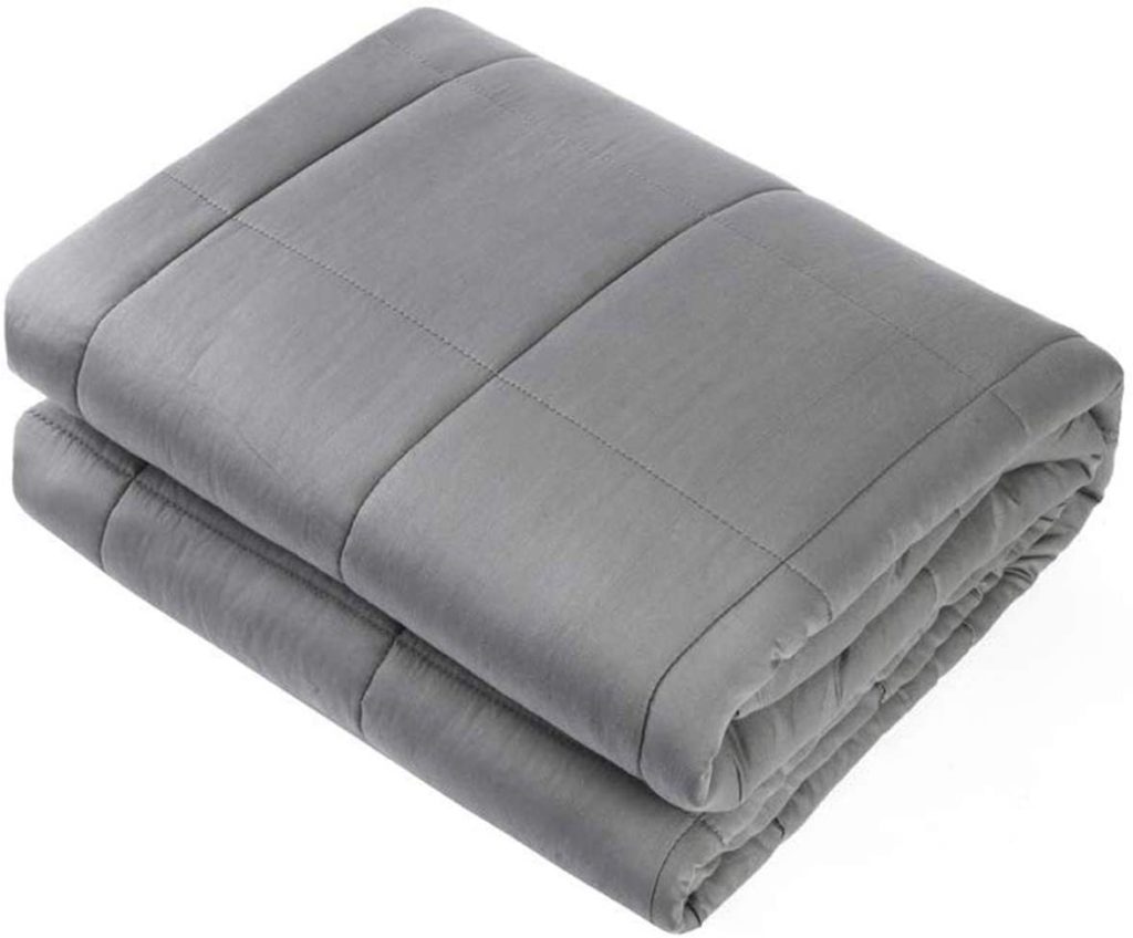 neatly folded grey weighted banket