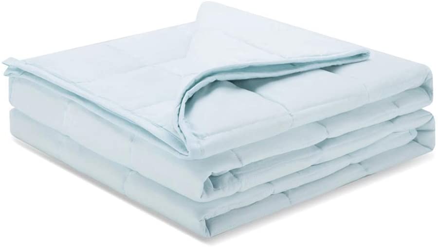 neatly folded light blue weighted blanket