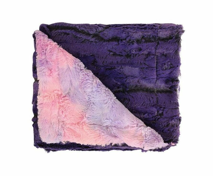 neatly folded soft faux fur purple weighed blanket