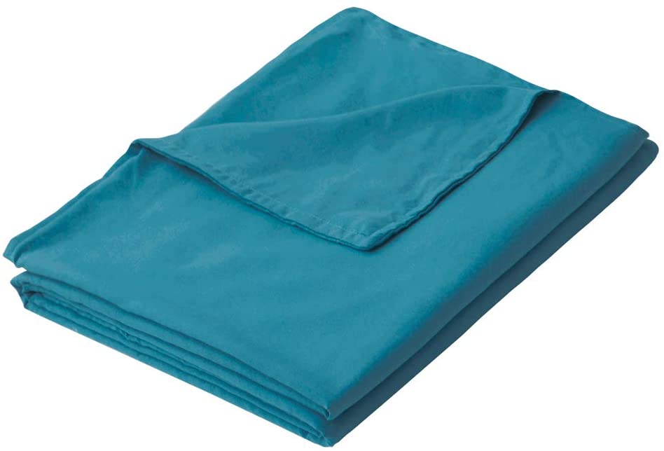neatly folded teal blanket cover