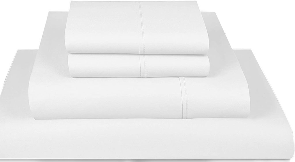 neatly folded white stacked sheets
